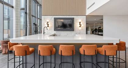 Stylish 2BR in Station Park | Private Patio + Spa, Gym & Bowling