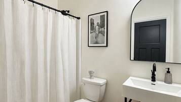 Shower, towels, soap, shampoo