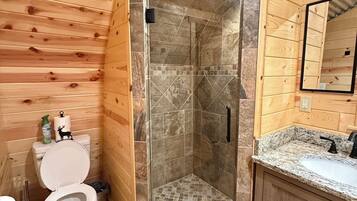Shower, towels, soap, toilet paper