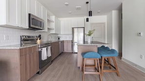 Fridge, dining tables - Landing | Stylish 1BD, Pool, Game Room (Largo)