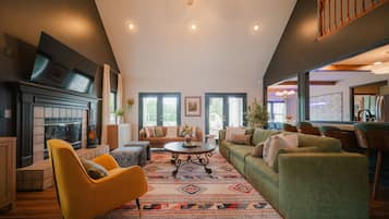 Smart TV, fireplace, foosball, books