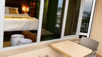 Deluxe Suite, Balcony | Desk, laptop workspace, iron/ironing board, free WiFi