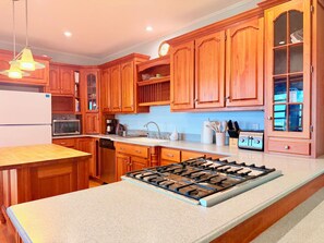 Private kitchen - Historic Coastal Retreat | Pool + Sandy Beach Access (Lawrencetown)