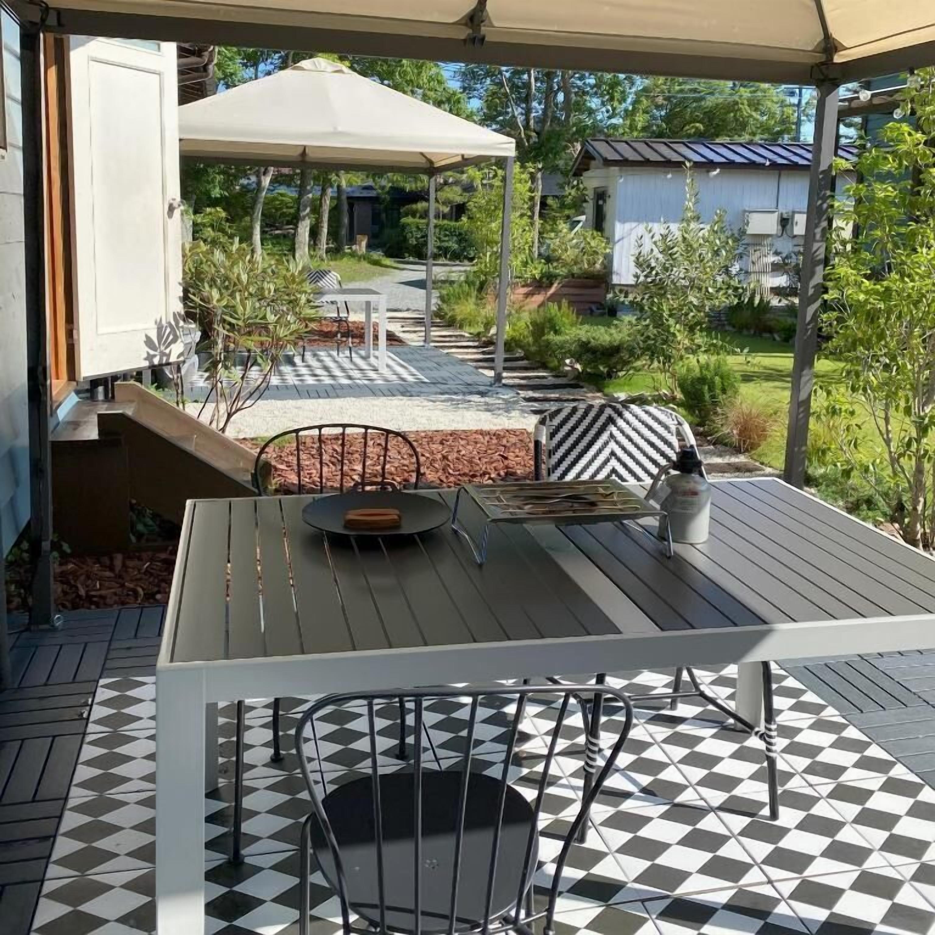 Villa Deluxe, patio, vista al jardín | Restaurante al aire libre