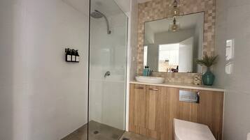 Shower, hair dryer, shampoo