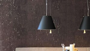 A modern dining area with a sofa, four chairs, and two pendant lights. - Hollywood 1 Appartement/Fewo 6-Bettwohnung by Interhome (Saas-Fee)