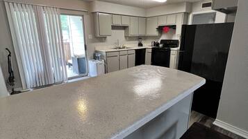 Fridge, oven, stovetop, electric kettle