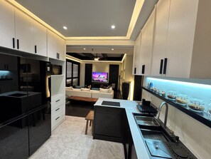 Private kitchen - 3BR 3BA Sleeps 6 | Architect-Designed | Heart of Poblacion | Kitchen + WD (Makati City)