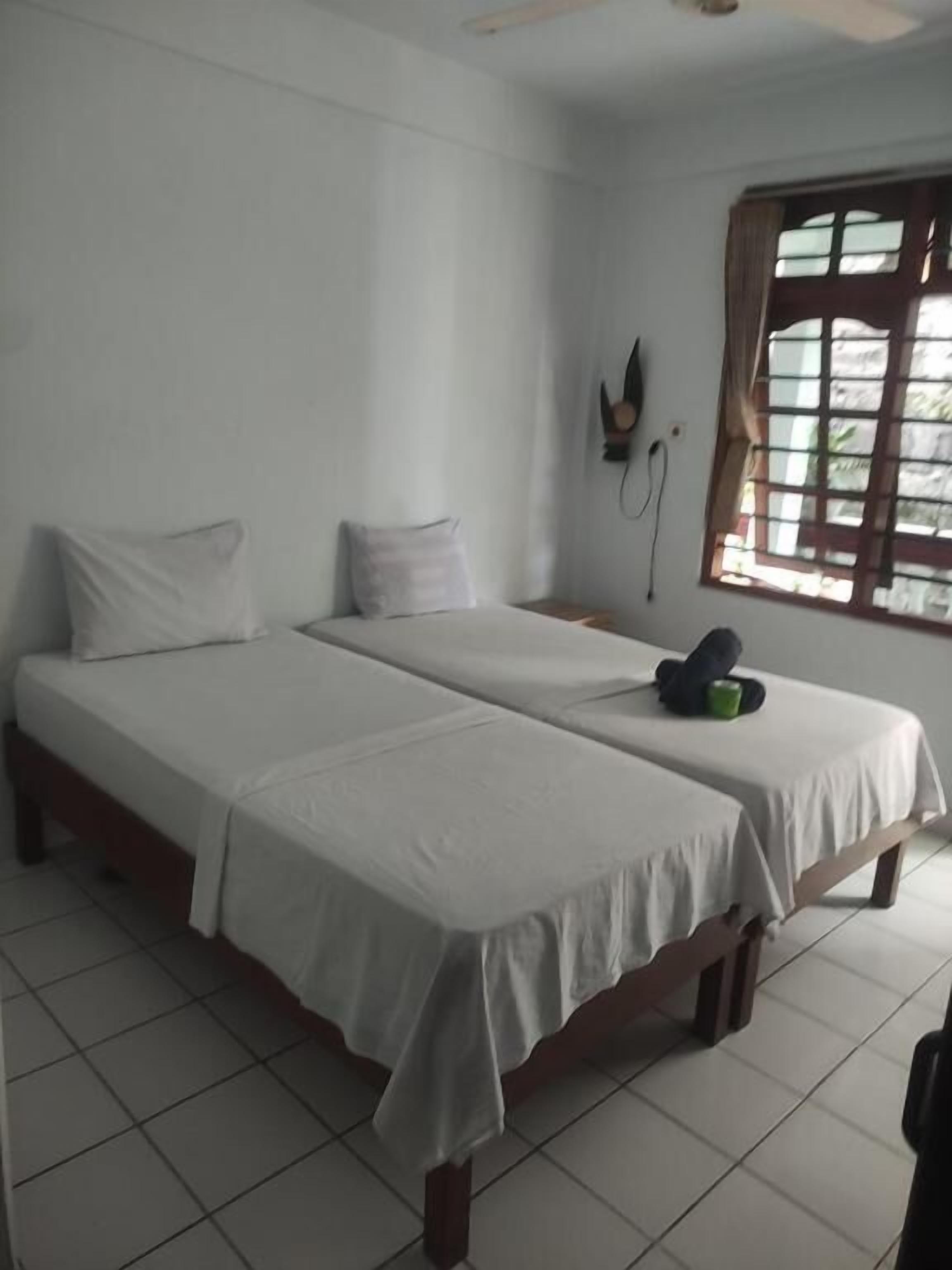 Economy Twin Room, Balcony | Desk, laptop workspace, free WiFi