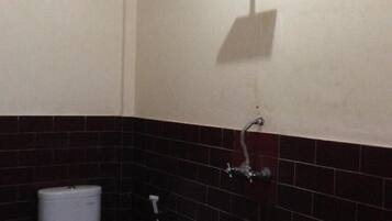 Economy Double Room, Balcony | Bathroom | Shower, towels, toilet paper
