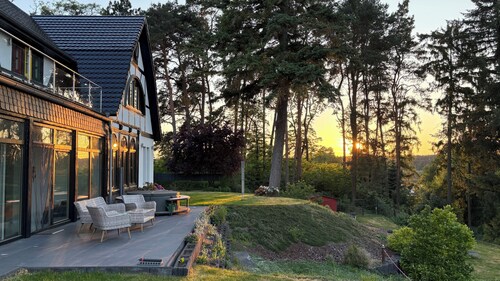 Röblinseeterrassen – Vacation Rental with a Terrace on a Park-Like Lakefront Property