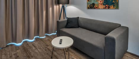 Deluxe Apartment, Balcony, City View | Desk, laptop workspace, soundproofing, iron/ironing board