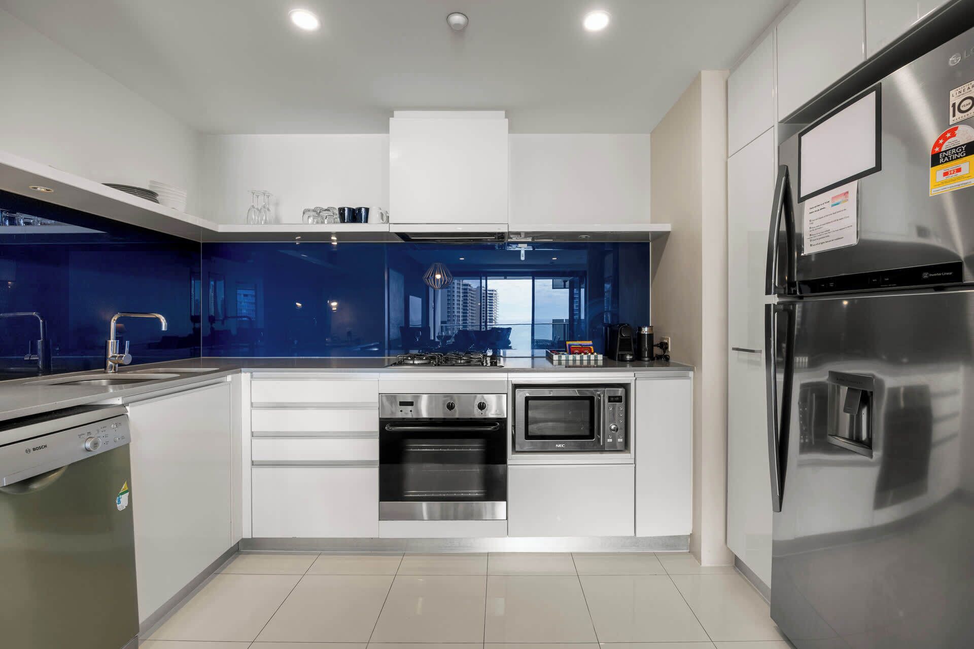 Coffee/tea maker, fridge, microwave, oven