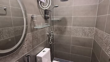 Shower, towels, soap, shampoo