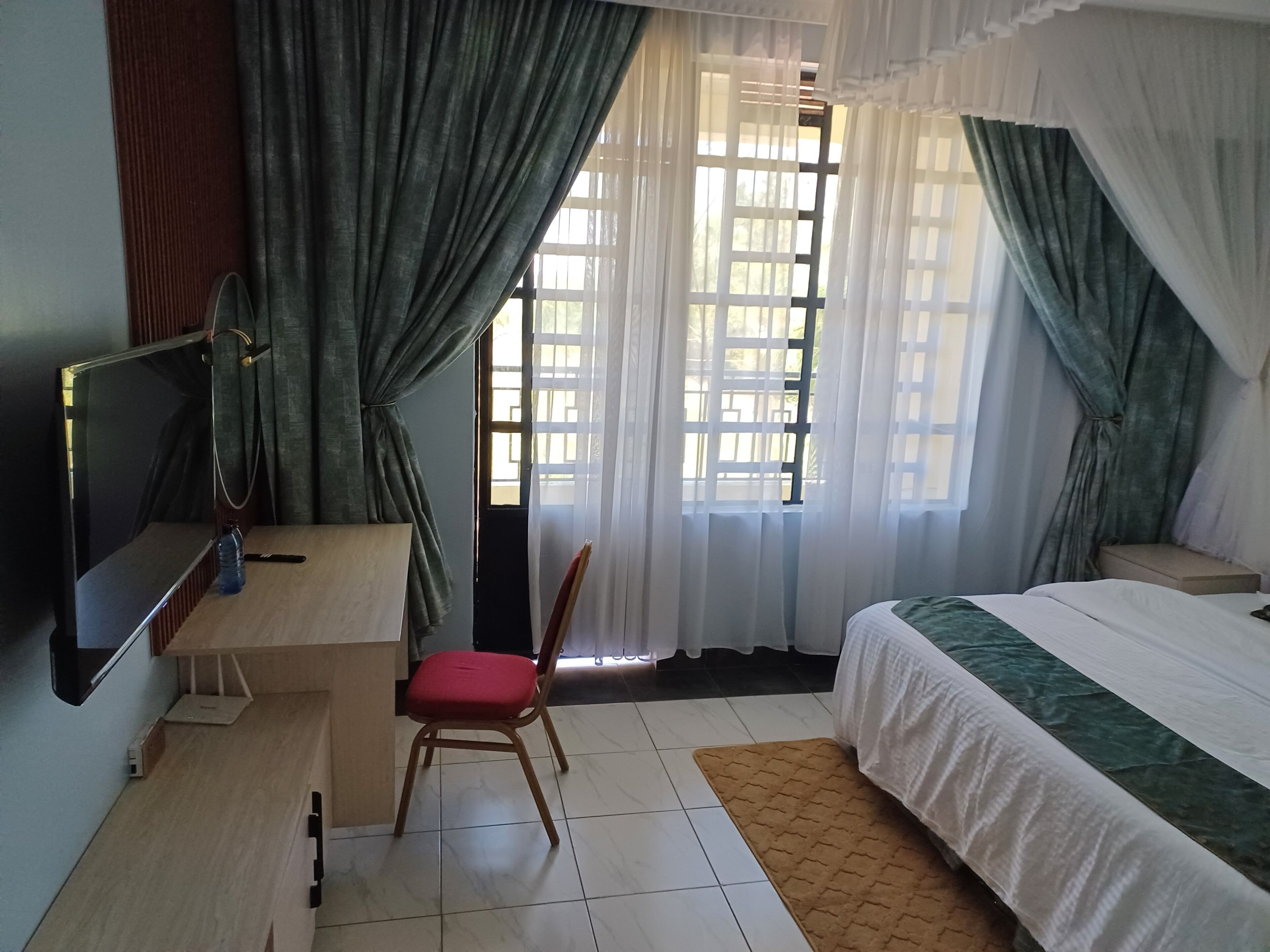 Deluxe Double Room, City View | Desk, laptop workspace, iron/ironing board, free WiFi