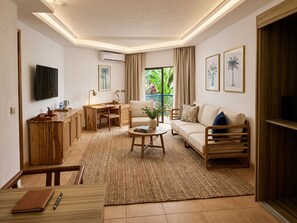 Suite Deluxe, vista al mar | Área de sala de estar | Impresora 
