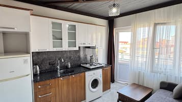 Deluxe-lejlighed - balkon - udsigt til have | Interiør