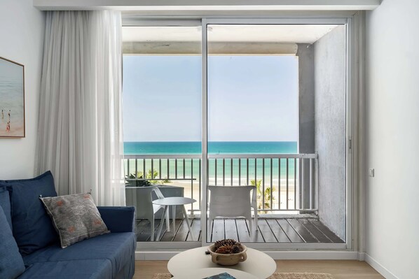 TV, offices - Modern 2BR Steps to Beach by HolyGuest (Tel Aviv-Yafo)