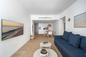 TV, offices - Modern 2BR Steps to Beach by HolyGuest (Tel Aviv-Yafo)