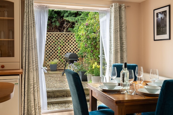 The stunning French doors leading out to your own private garden.