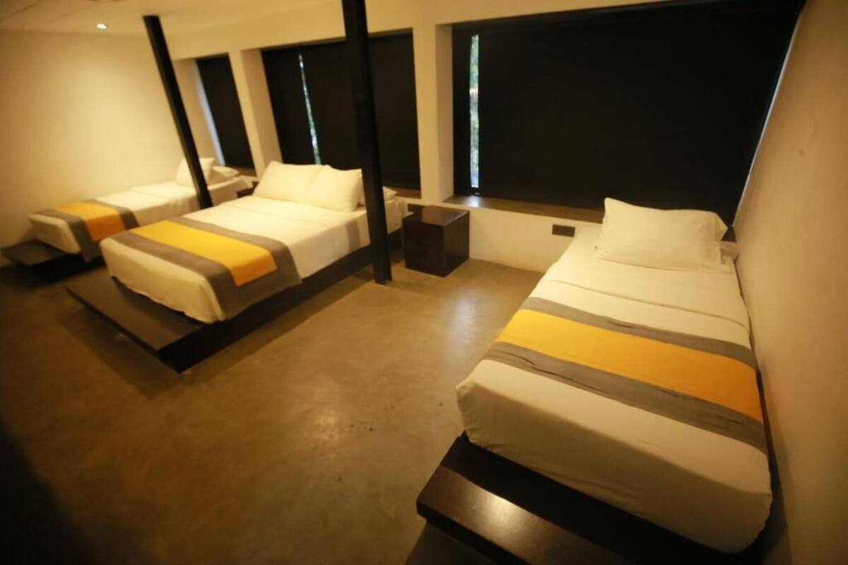 Deluxe Quadruple Room, Courtyard View | In-room safe, blackout drapes, WiFi (free)
