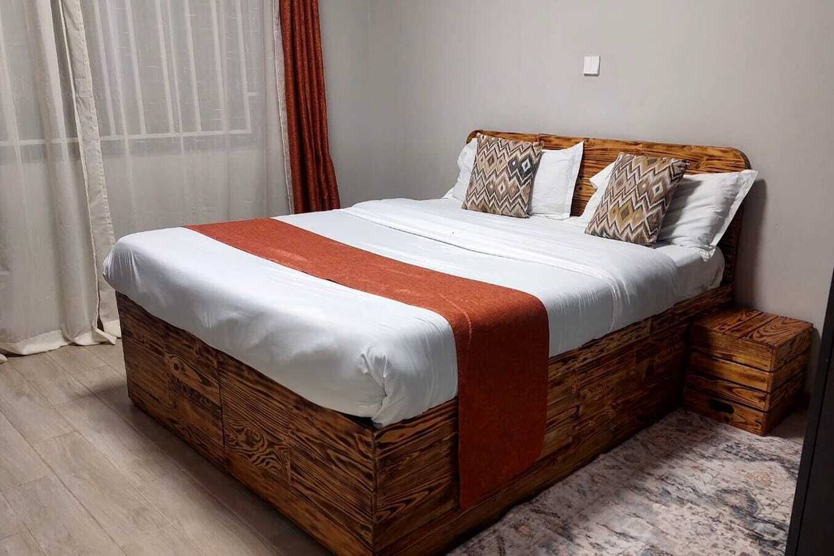Economy Double Room, Balcony, Garden View | Iron/ironing board, WiFi (free), bed sheets