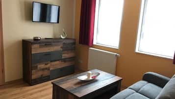 Doppel- oder Zweibettzimmer | Wohnbereich