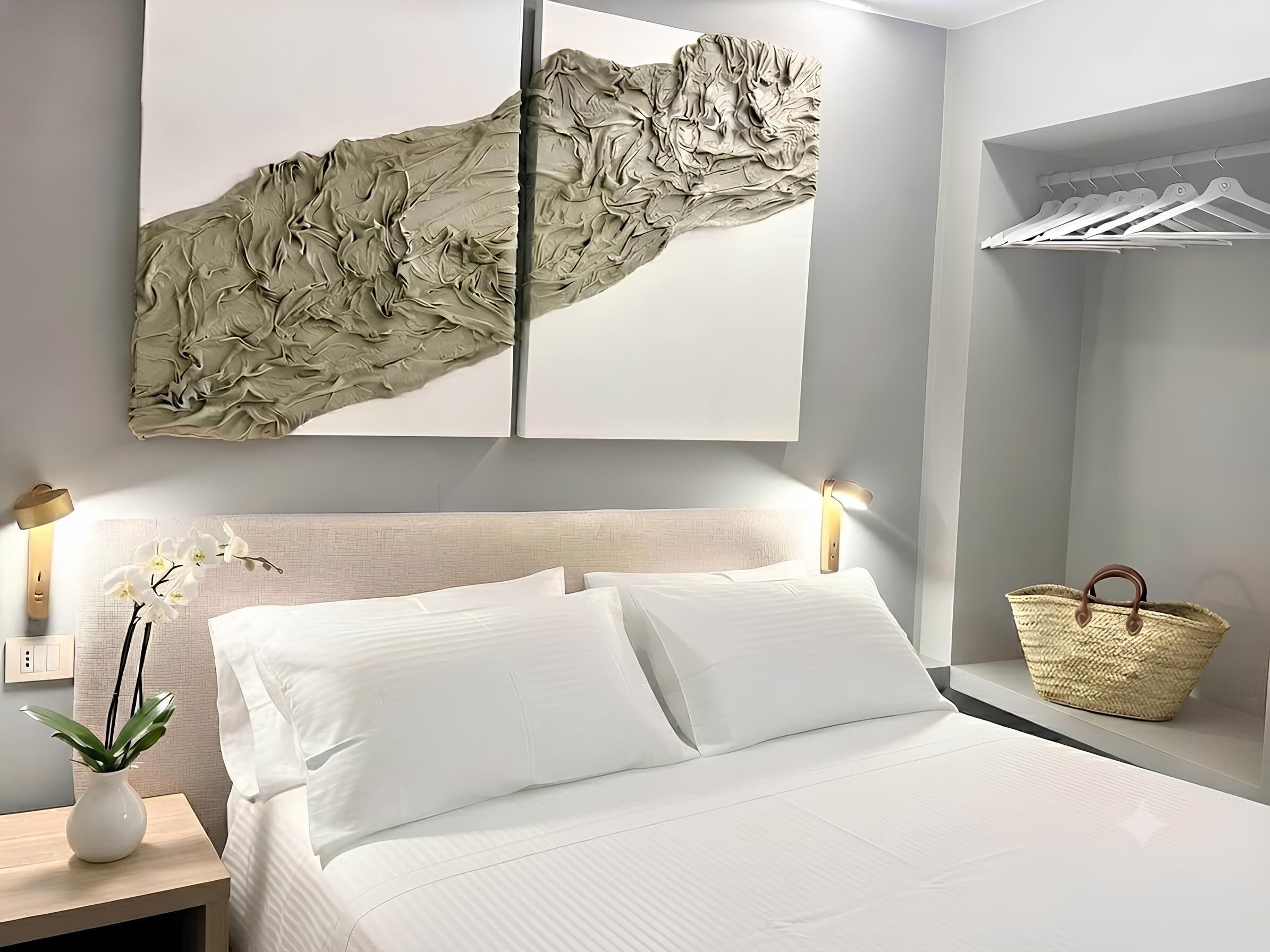 Chambre Deluxe double ou avec lits jumeaux, vue sur la cour intérieure | Literie de qualité, couette en duvet, articles de minibar gratuits