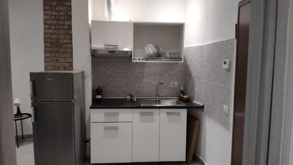 Deluxe Studio | Private kitchen | Full-sized fridge, microwave, stovetop, cookware/dishes/utensils
