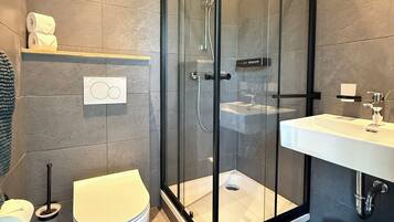 Deluxe Double Room, 1 Queen Bed, Private Bathroom, Mountain View | Bathroom | Shower, hair dryer, towels, soap