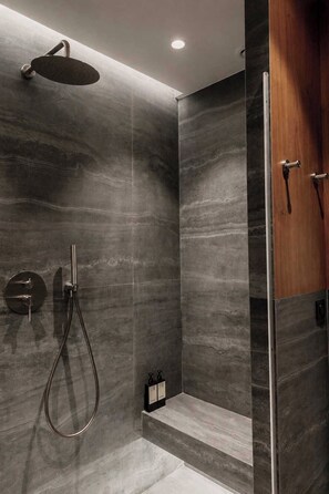 A modern shower with a handheld showerhead, a wall-mounted faucet, and a handheld hose. - Stunning A/C Flat -1bdr/4p- Saint-germain-des-pres (Paris)