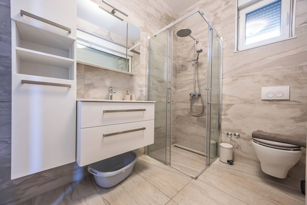 Casa Deluxe, lanai, vista al océano | Baño