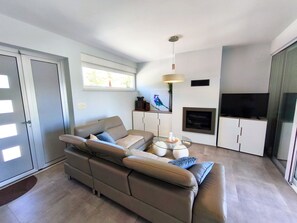 Casa Deluxe, lanai, vista oceano | Area soggiorno