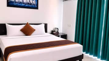 Camera Deluxe con letto matrimoniale o 2 letti singoli | Ferro/asse da stiro, Wi-Fi gratuito