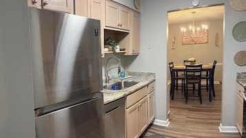 Coffee/tea maker, fridge, microwave, oven