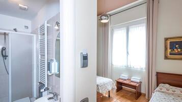 Shower, free toiletries, hair dryer, towels