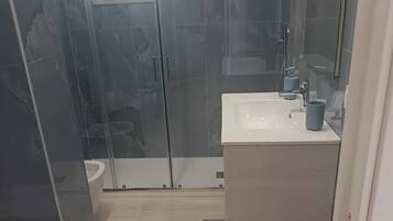 Shower, free toiletries, hair dryer, soap