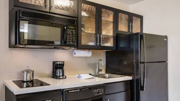 Coffee/tea maker, fridge, microwave, paper towels