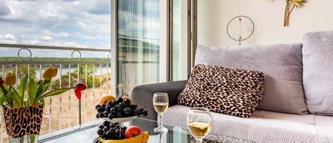 Apartment (Classic One Bedroom Apartment with Te) | Living room | 32-inch flat-screen TV with satellite channels
