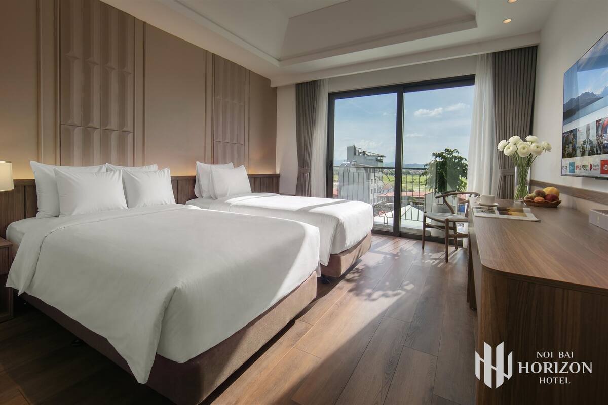 Junior Triple Room, Balcony, Mountain View | In-room safe, desk, laptop workspace, blackout drapes