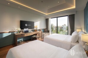 Family Triple Room, Balcony, City View | In-room safe, desk, laptop workspace, blackout drapes - Noi Bai Horizon Hotel & Spa (Noi Bai)