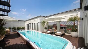 10 outdoor pools, pool umbrellas, pool loungers