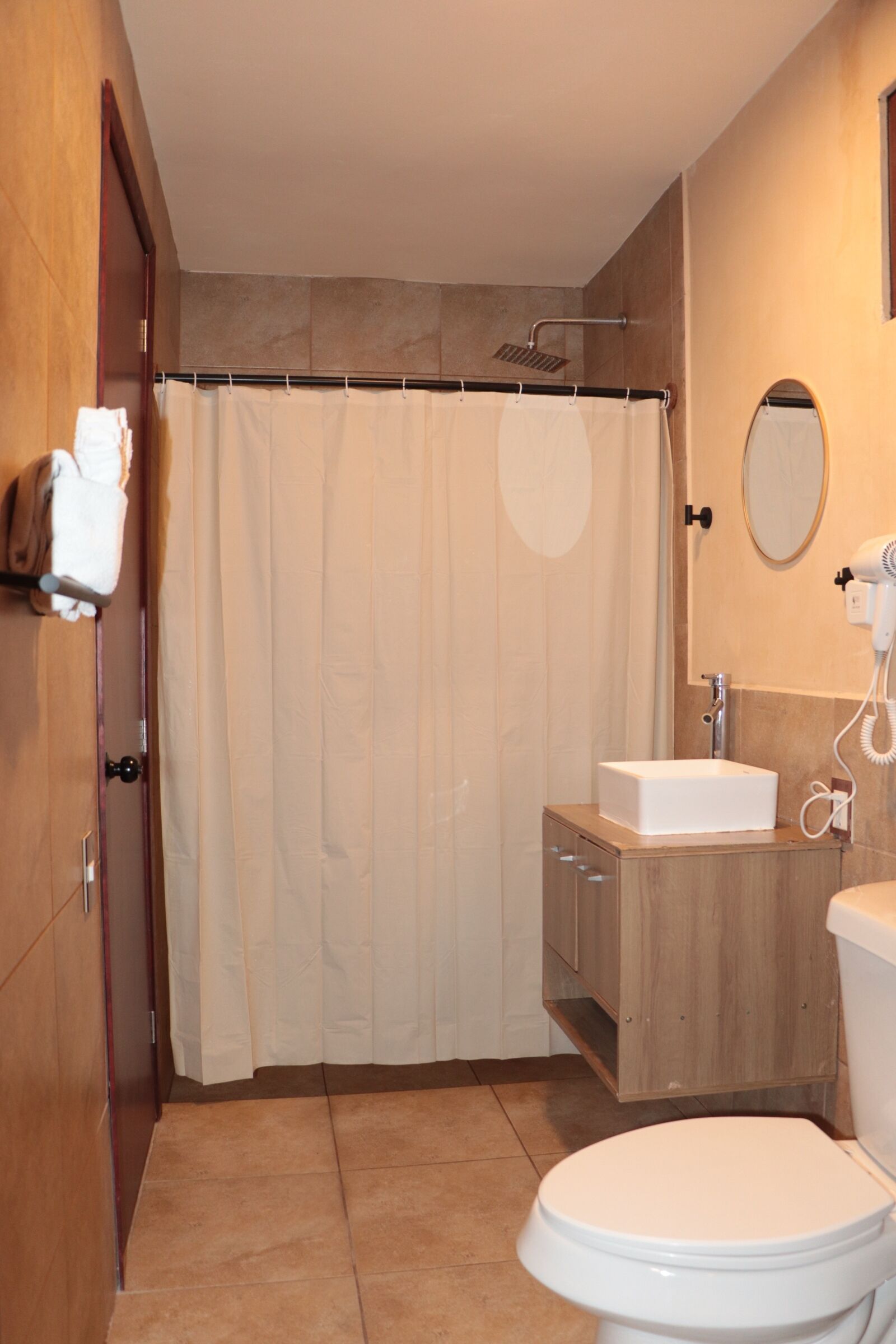 Hair dryer, towels, soap, toilet paper