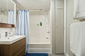 Shower, towels, soap, toilet paper