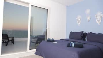 Desk, laptop workspace, blackout curtains, iron/ironing board