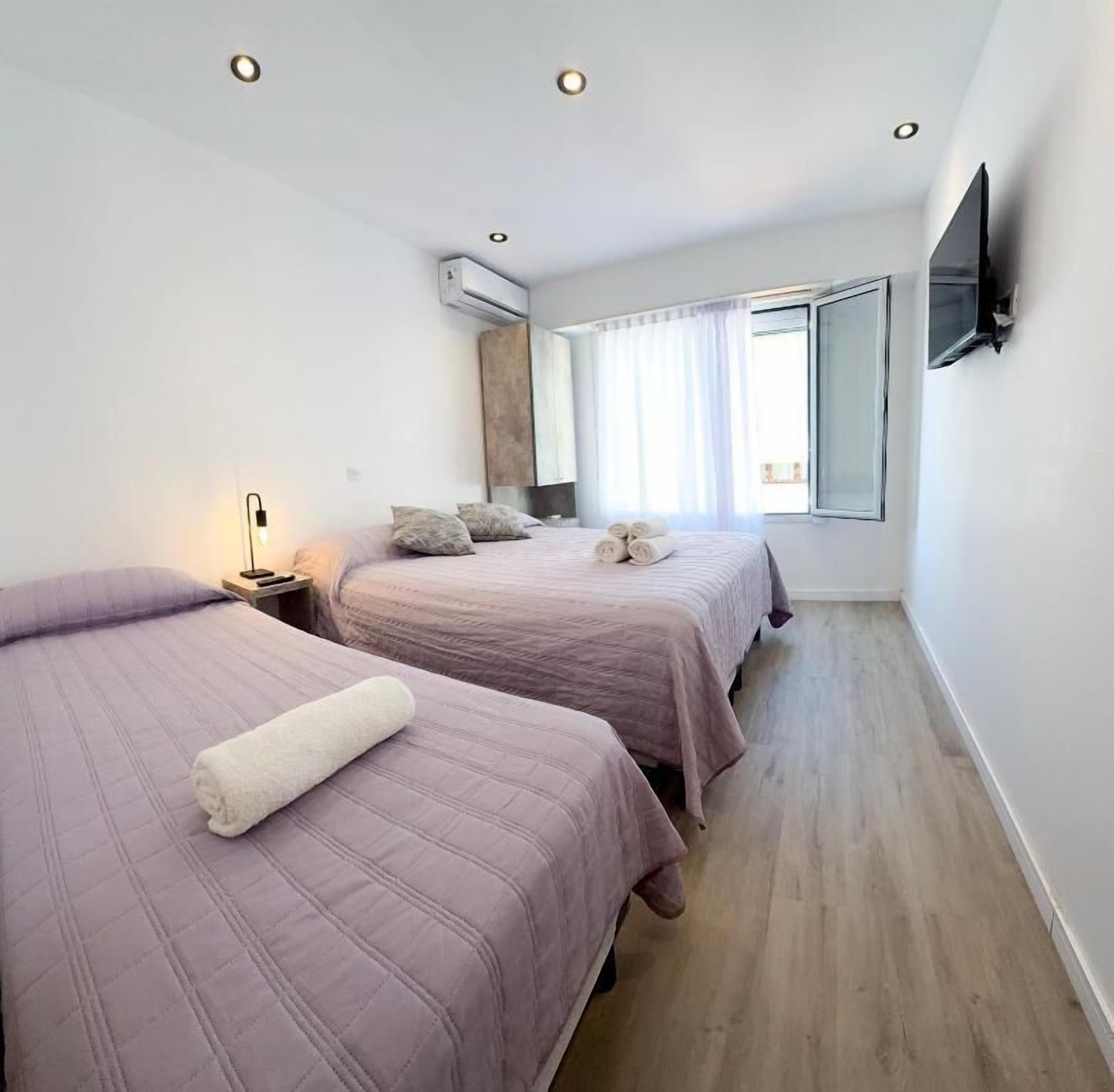 Deluxe Triple Room, Courtyard View | In-room safe, free WiFi