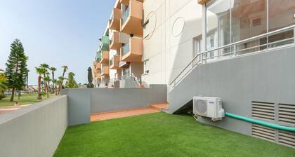 Appartement premium familial à Almerimar, vue sur jardin et piscine