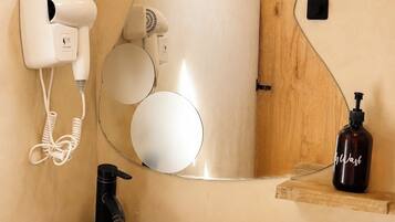 Hair dryer, towels, soap, toilet paper