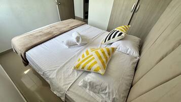 Family Apartment, City View | Iron/ironing board, free WiFi