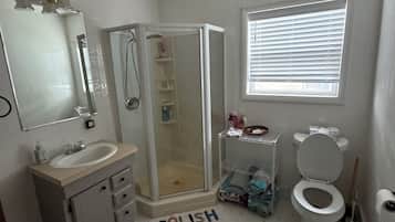 Shower, hair dryer, towels, soap